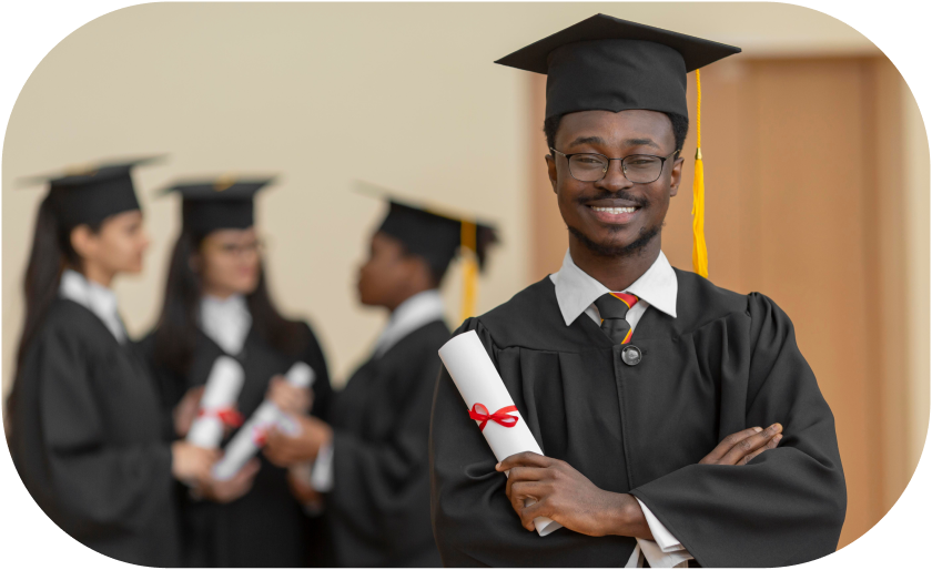 Schoolville graduates in caps and gowns